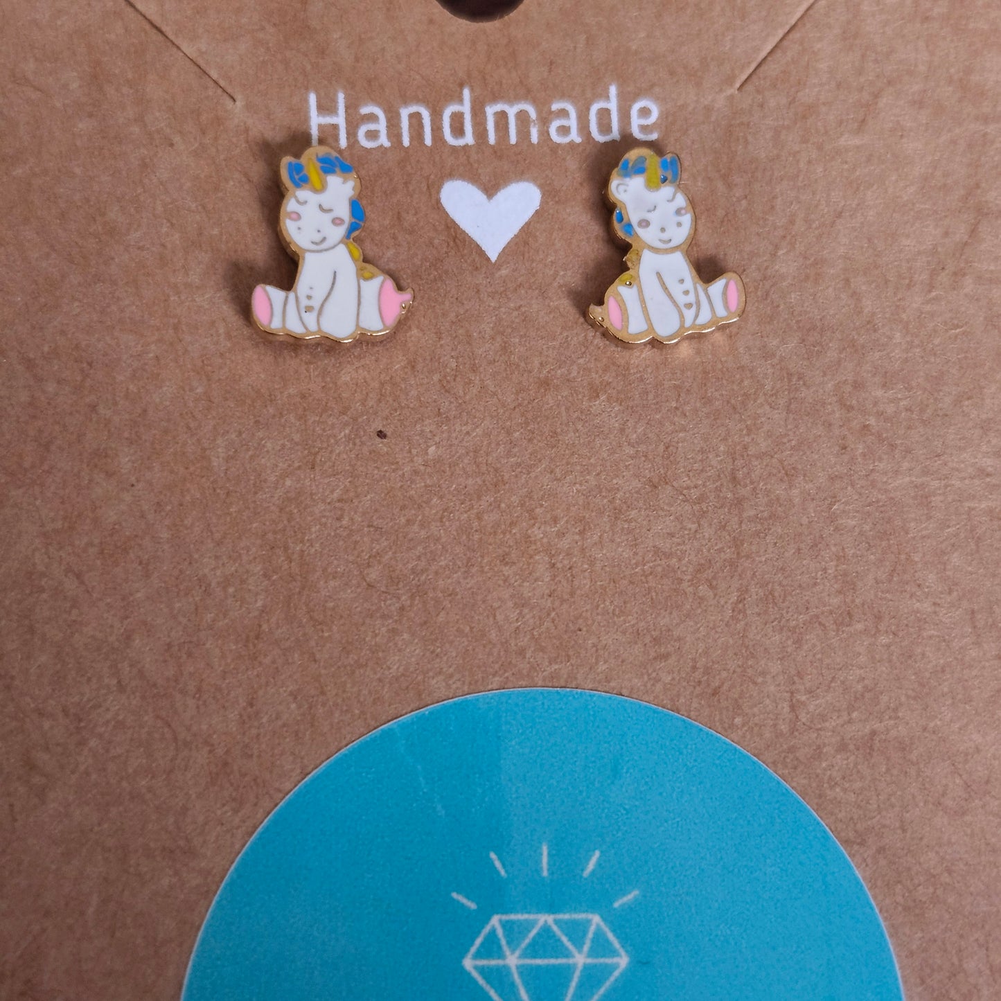 Boucles d'oreille licorne - or