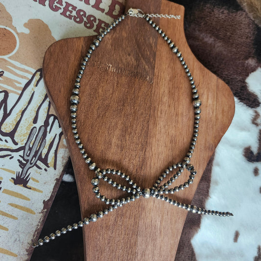 Collier boucle en perles