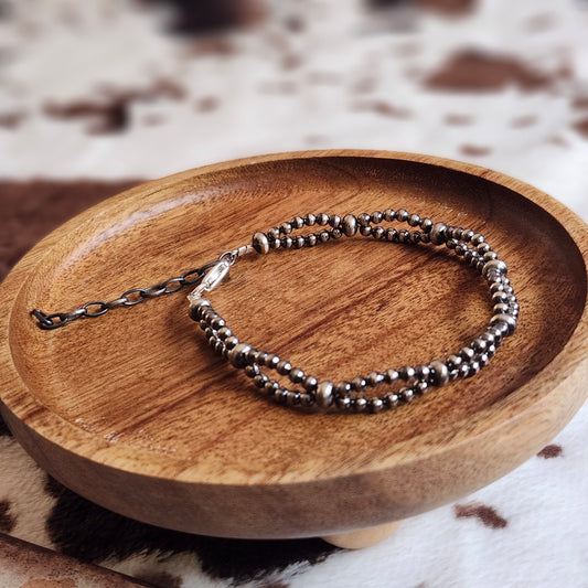 Bracelet torsadé de perles